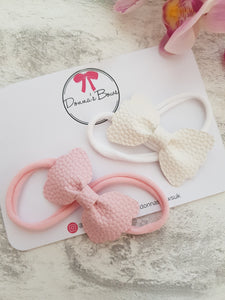 Pinch bow headbands