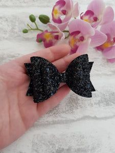 Black glitter bow