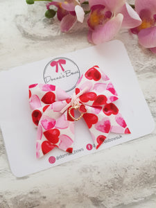 Heart & Charm Bow